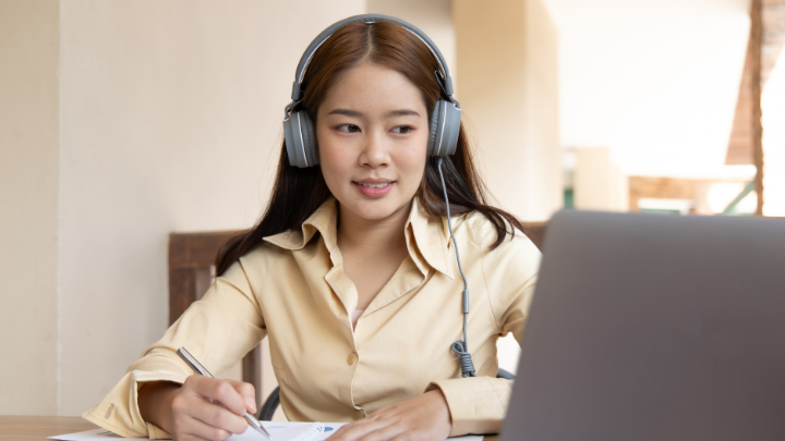 Person studying and working on laptop