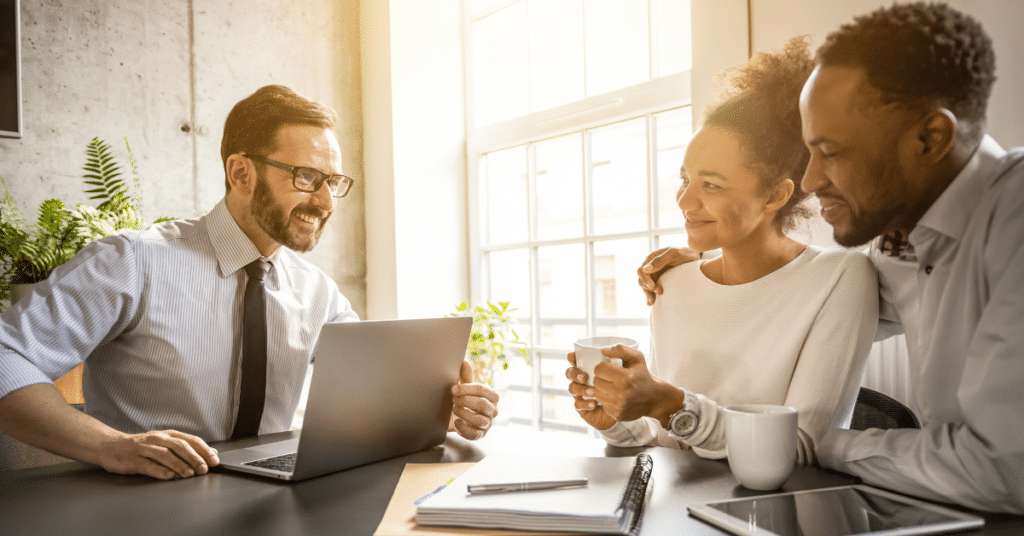 Two people meeting with someone