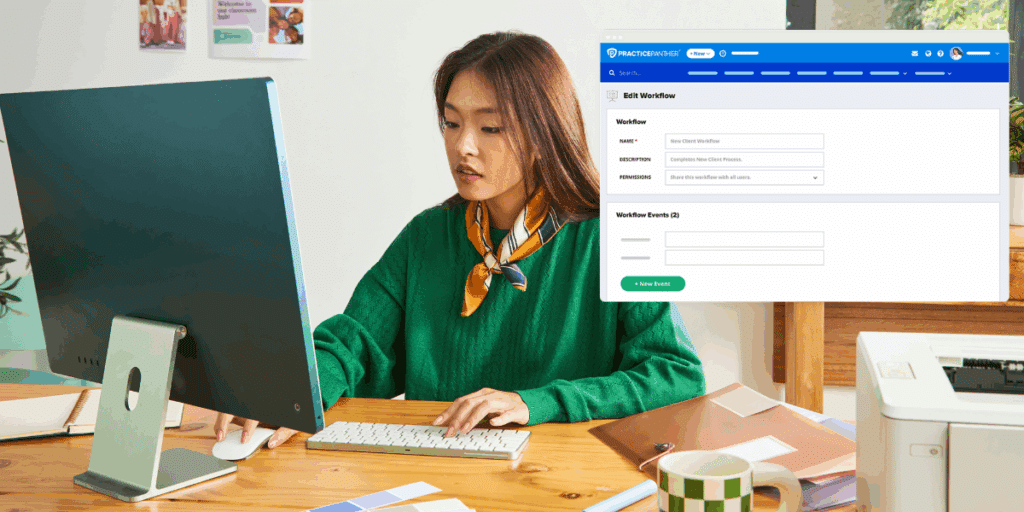 A young, female lawyer looking at her computer screen, researching legal software