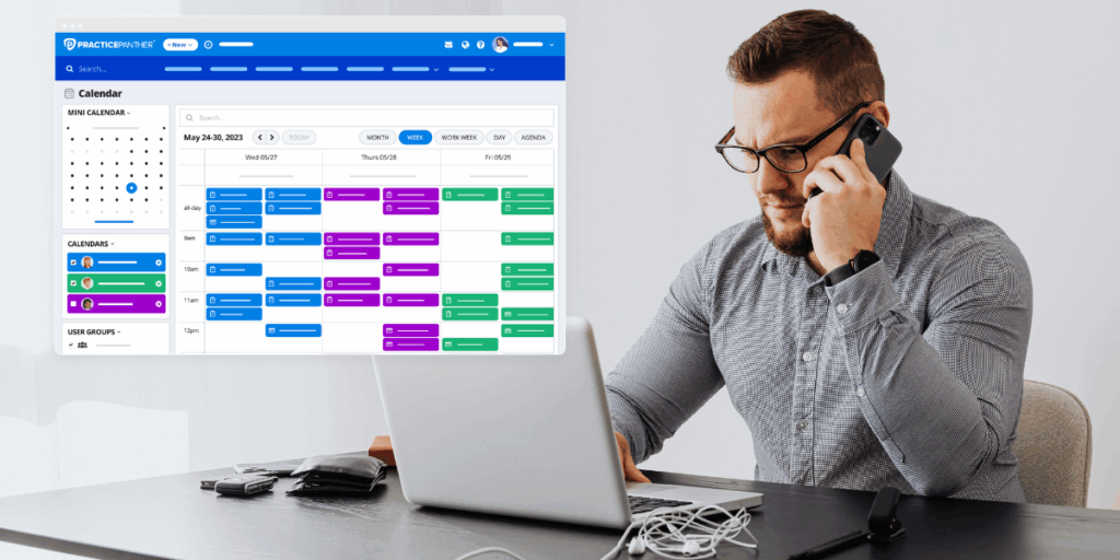 Male lawyer at his desk looking at a calendar dashboard on PracticePanther's platform