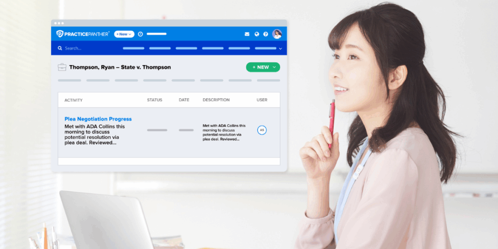 Female lawyer smiling while looking at case information in a PracticePanther dashboard.